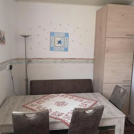 Risel-ferienhaus-im-huus-godewind-mit-sauna-und-kamin Holiday home Dornumersiel