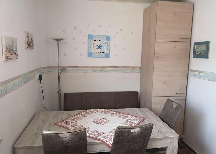 Risel-ferienhaus-im-huus-godewind-mit-sauna-und-kamin Vakantiehuis Dornumersiel